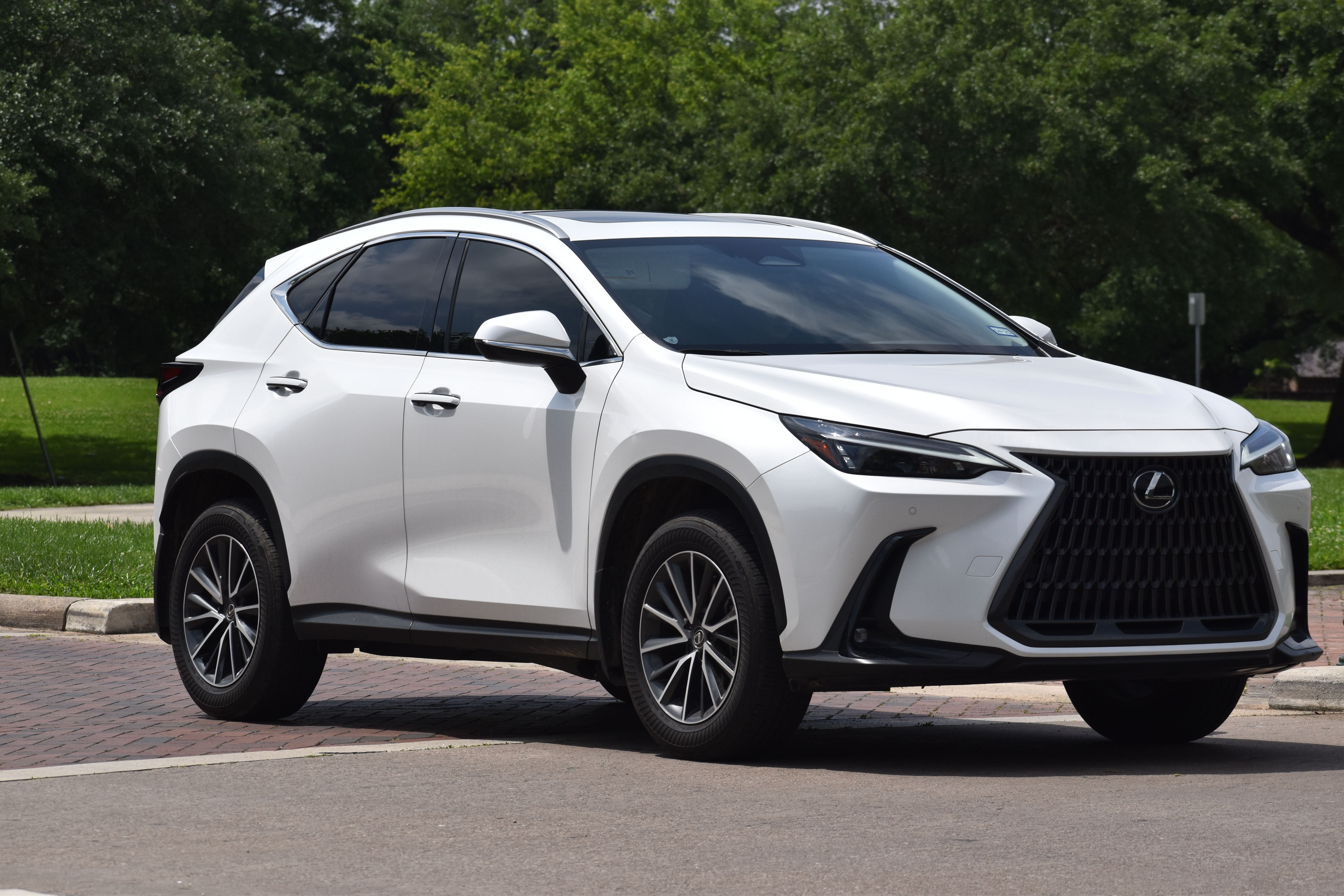 Lexus repair and maintenance specialists in Van Nuys, CA with Sean's Auto Care. Image of newer white Lexus SUV parked sideways in parking lot.