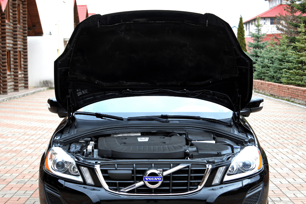 volvo repair, auto repair in Van Nuys, CA at Sean's Auto Care. The hood of a black Volvo car raised, revealing the engine compartment.