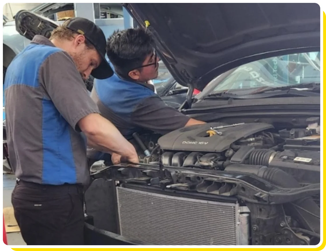 Cooling System Repair near me in Los Angeles and Van Nuys, CA with Sean’s Auto Care. Image of mechanic working on car in Van Nuys, CA for cooling system maintenance