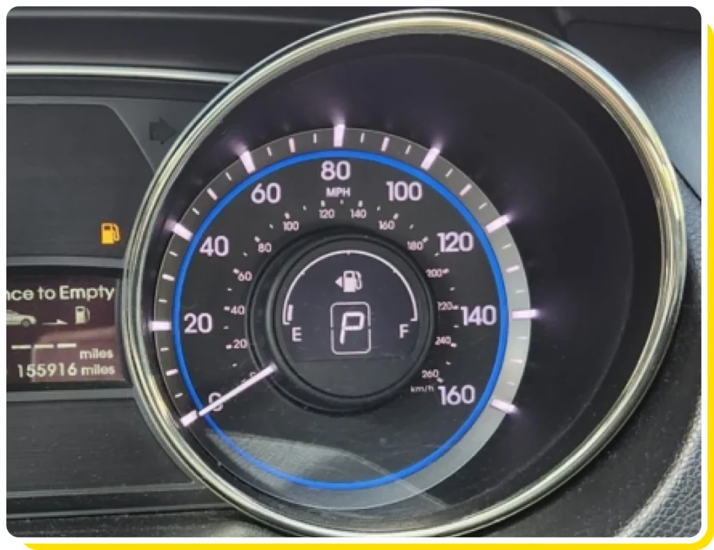 Fuel system service near me in Los Angeles and Van Nuys, CA with Sean’s Auto Care. Image of a car dashboard displaying the speedometer and an illuminated check engine light.